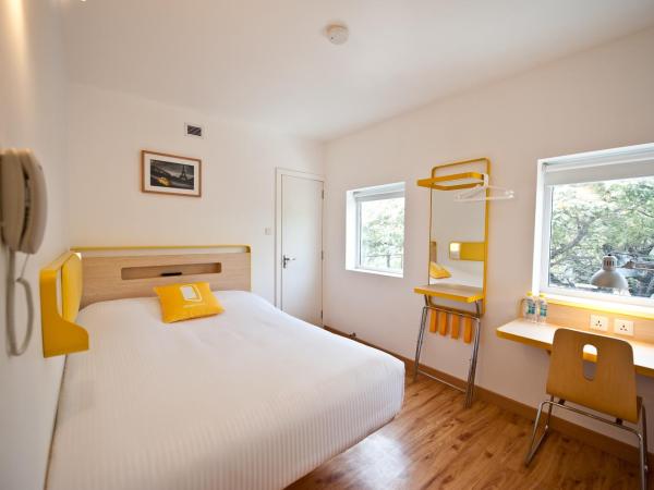 bloomrooms @ Indiranagar : photo 1 de la chambre value queen room