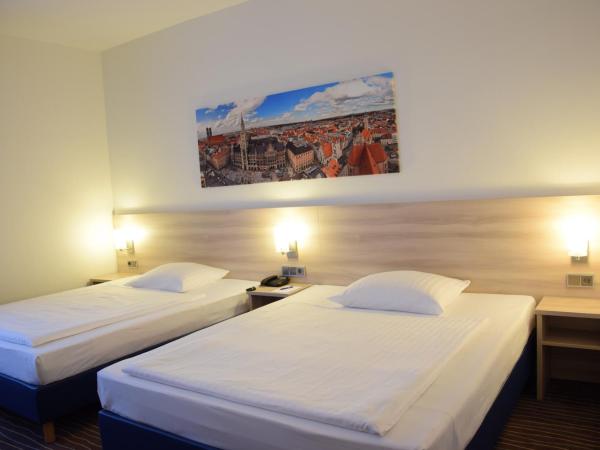 AMBER ECONTEL : photo 2 de la chambre chambre simple Économique