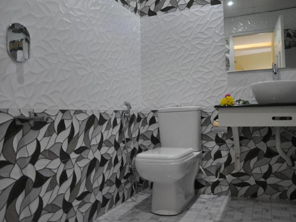 Daffodils Spice Court : photo 7 de la chambre chambre supérieure lit queen-size