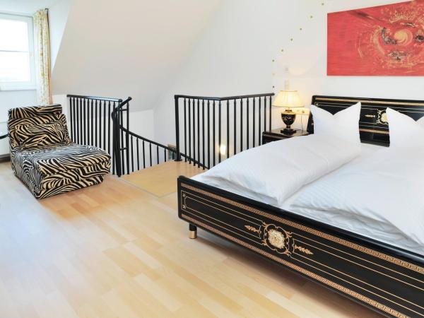 Hotel Schwarzer Adler Innsbruck : photo 9 de la chambre suite