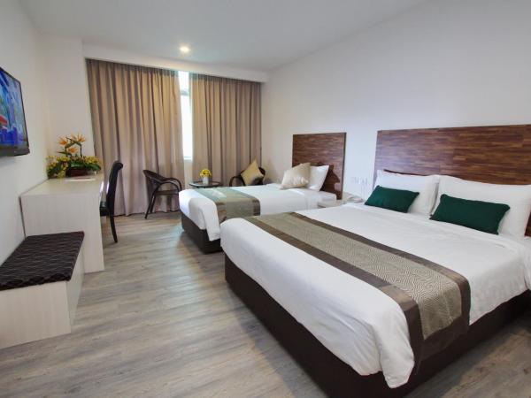 Molek Garden Hotel : photo 3 de la chambre chambre triple deluxe