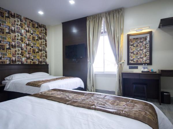 Island Guesthouse - Previously known as Islander Lodge : photo 1 de la chambre suite familiale