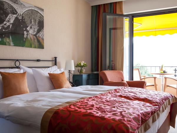 Boutique-HOTEL REMORINO, a Private Selection Hotel : photo 4 de la chambre chambre double supérieure - vue sur lac