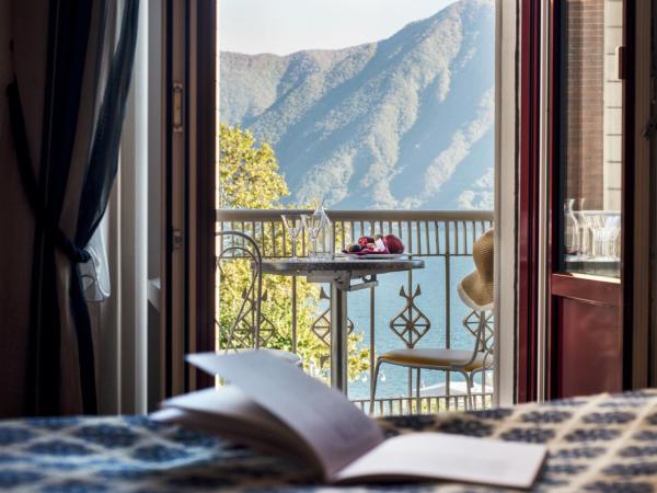 International au Lac Historic Lakeside Hotel : photo 7 de la chambre chambre double ou lits jumeaux panorama avec balcon - vue sur lac