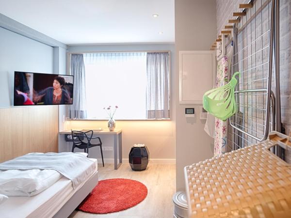 MLOFT Apartments München : photo 3 de la chambre standard studio with kitchenette (1 adult)