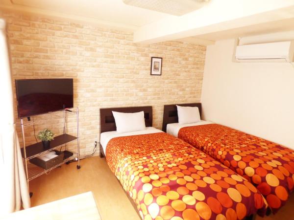 Kyoto Uraraka Guest House : photo 2 de la chambre chambre lits jumeaux standard