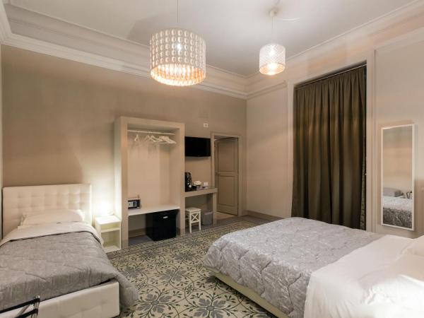 Matera In Vacanza : photo 5 de la chambre chambre quadruple avec salle de bains privative