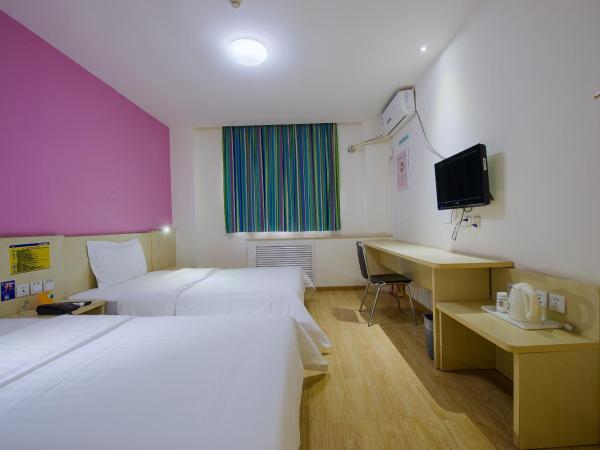 7Days Premium Guangzhou Kecun Subway Station : photo 1 de la chambre chambre lits jumeaux