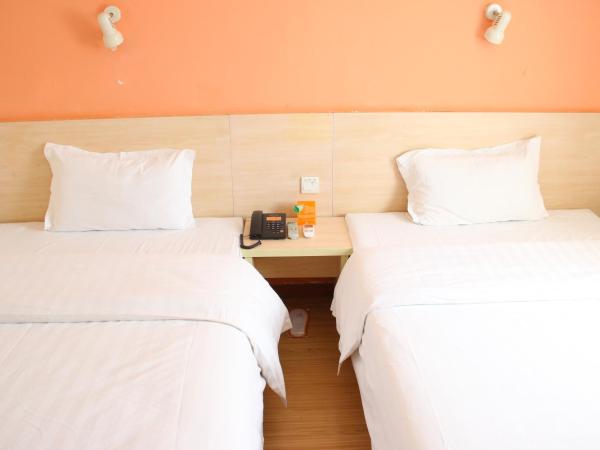 7Days Premium Guangzhou Kecun Subway Station : photo 2 de la chambre chambre lits jumeaux