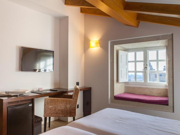 Hotel San Miguel : photo 9 de la chambre chambre lits jumeaux