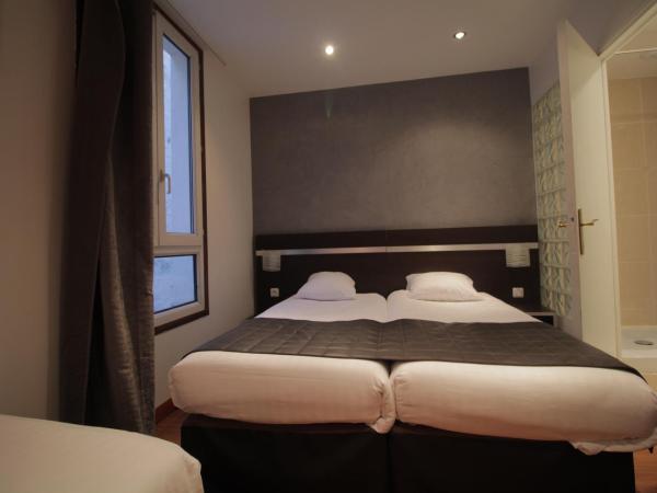 Modern's Hotel : photo 3 de la chambre chambre lits jumeaux