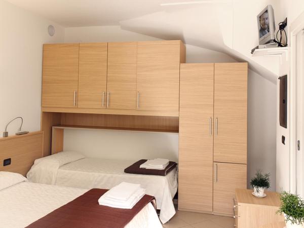 Nice Hotel Bibione : photo 1 de la chambre chambre triple confort