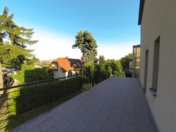 Noclegi Słodki Sen 1 : photo 2 de la chambre chambre quadruple avec balcon 