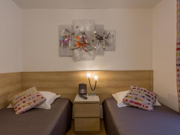 Hotel De L'Horloge : photo 4 de la chambre studio lits jumeaux supérieur