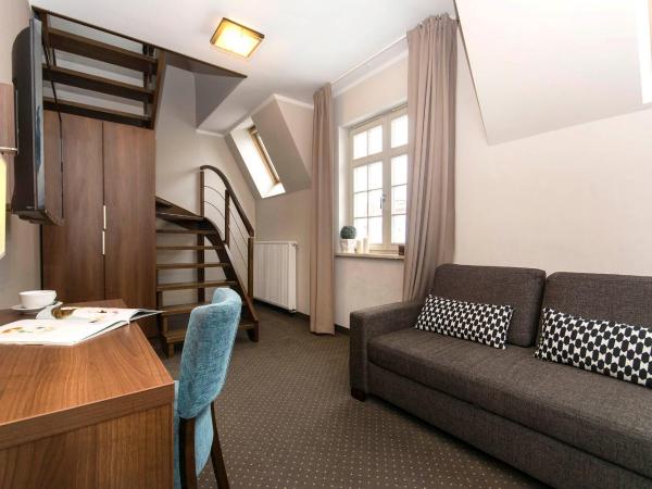 Apart Neptun : photo 4 de la chambre chambre lit queen-size 