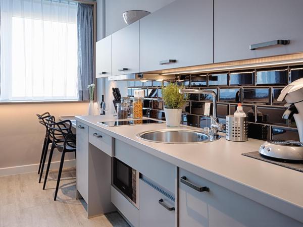 MLOFT Apartments München : photo 2 de la chambre standard studio with kitchenette (1 adult)