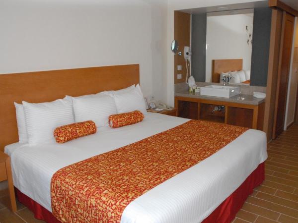 Aranzazu Centro Historico : photo 3 de la chambre chambre exécutive - 1 lit king-size