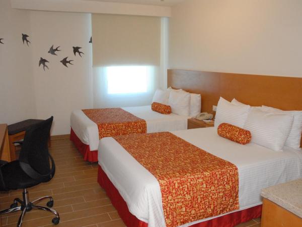 Aranzazu Centro Historico : photo 2 de la chambre chambre exécutive - 2 lits doubles