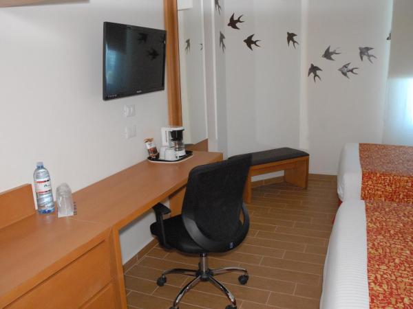 Aranzazu Centro Historico : photo 3 de la chambre chambre exécutive - 2 lits doubles