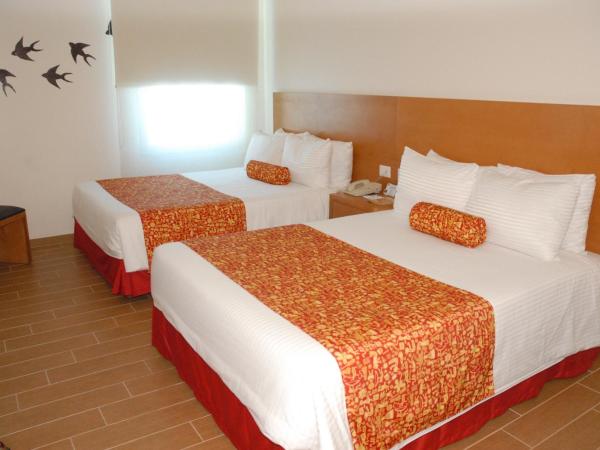 Aranzazu Centro Historico : photo 5 de la chambre chambre exécutive - 2 lits doubles