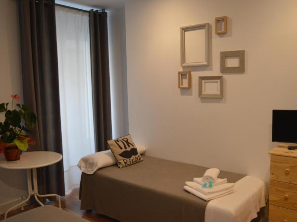 Hotel Smile & Co Hostal Boutique : photo 5 de la chambre chambre triple