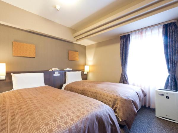 Hotel Sunroute Sapporo : photo 2 de la chambre chambre lits jumeaux - fumeurs