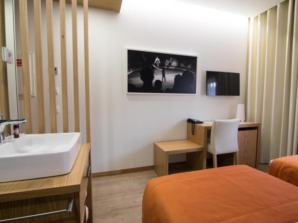 Porto Coliseum Hotel : photo 1 de la chambre chambre lits jumeaux standard