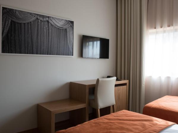 Porto Coliseum Hotel : photo 7 de la chambre chambre lits jumeaux standard