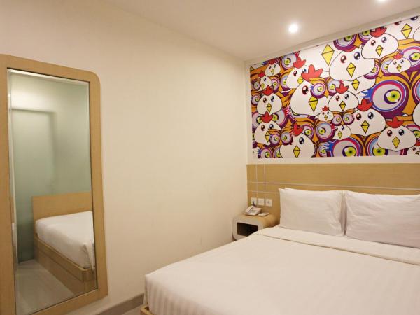 Nite & Day Surabaya - Gunungsari : photo 4 de la chambre chambre double ou lits jumeaux