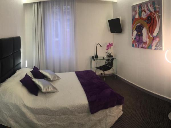 Hôtel Le Capitole : photo 6 de la chambre chambre double supérieure avec baignoire