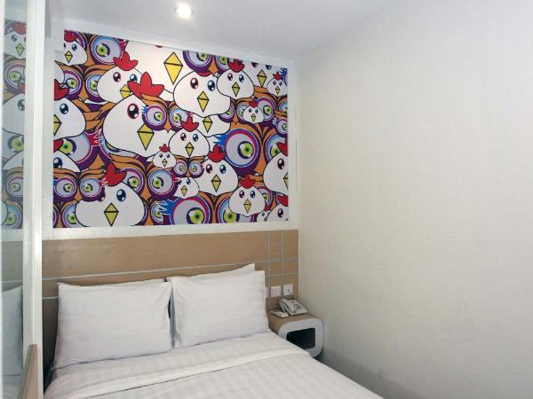 Nite & Day Surabaya - Gunungsari : photo 2 de la chambre chambre double ou lits jumeaux