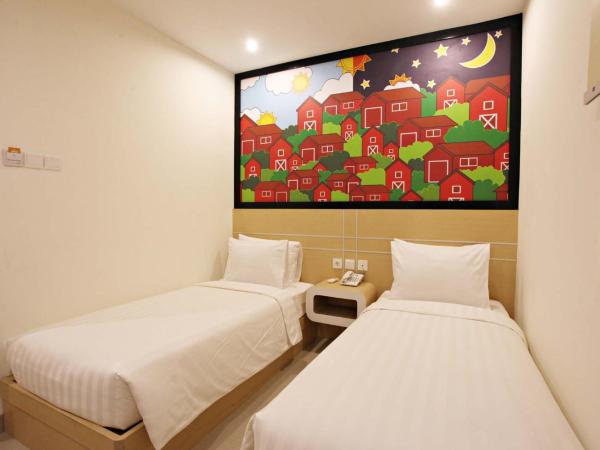 Nite & Day Surabaya - Gunungsari : photo 4 de la chambre chambre double ou lits jumeaux standard