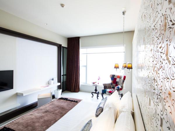 Mode Sathorn Hotel - SHA Extra Plus : photo 2 de la chambre chambre deluxe double ou lits jumeaux