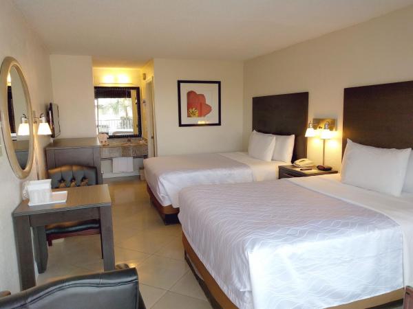 Red Carpet Inn Airport Fort Lauderdale : photo 2 de la chambre chambre deluxe avec 2 lits queen-size