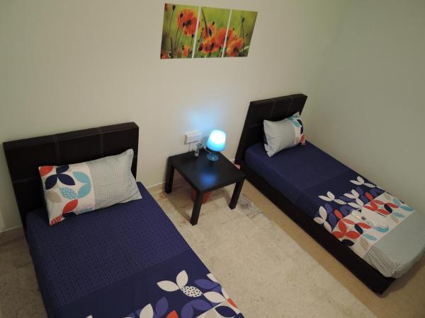 The Pillohouzzze : photo 2 de la chambre chambre lits jumeaux standard avec salle de bains commune