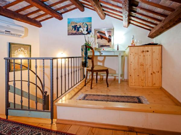 Residence LA CARERA Centro Storico : photo 5 de la chambre appartement en duplex