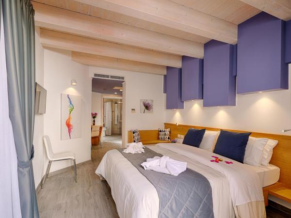 Hospitality Hotel : photo 5 de la chambre chambre triple