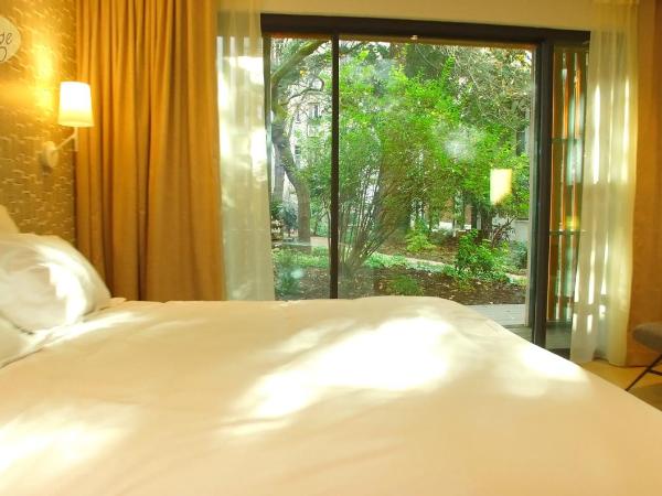 Eden Lodge Paris : photo 5 de la chambre chambre double ou lits jumeaux avec terrasse