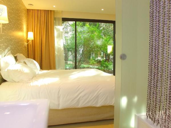 Eden Lodge Paris : photo 6 de la chambre chambre double ou lits jumeaux avec terrasse