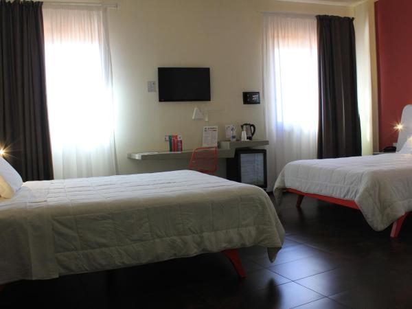 Ibis Styles Palermo President : photo 2 de la chambre chambre supérieure avec 2 lits doubles