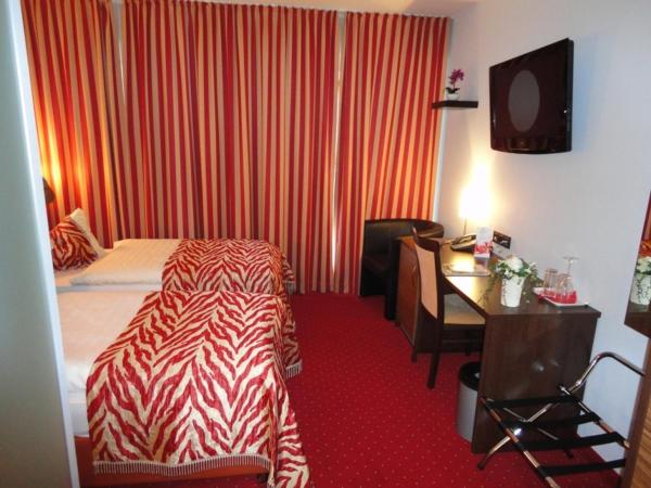 Grand Hotel Dream Main City Center : photo 2 de la chambre chambre simple deluxe