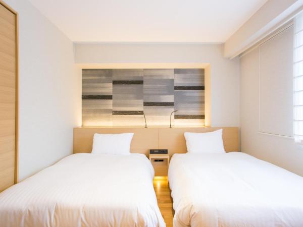 Nishitetsu Hotel Croom Hakata : photo 1 de la chambre chambre lits jumeaux confort - non-fumeurs