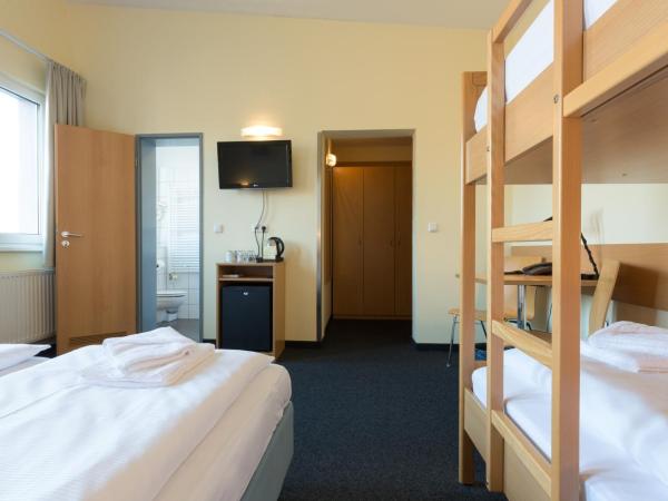 Familienhotel Citylight : photo 6 de la chambre chambre quadruple