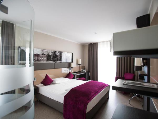 Amalienburg - Boutique & Boarding Hotel : photo 4 de la chambre chambre triple deluxe