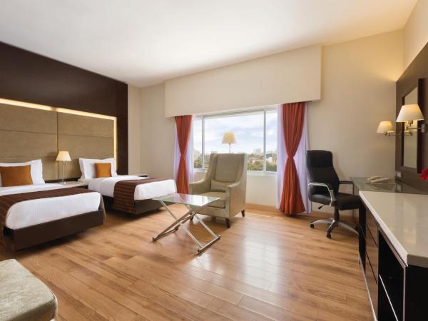 Ramada Chennai Egmore : photo 4 de la chambre executive twin non-smoking room - book & unlock exclusive deals