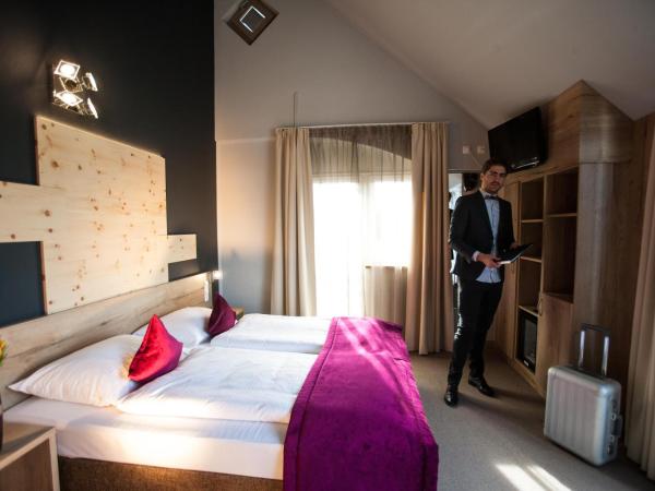 Amalienburg - Boutique & Boarding Hotel : photo 6 de la chambre chambre triple confort