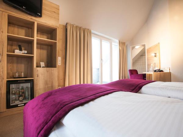 Amalienburg - Boutique & Boarding Hotel : photo 3 de la chambre chambre triple confort