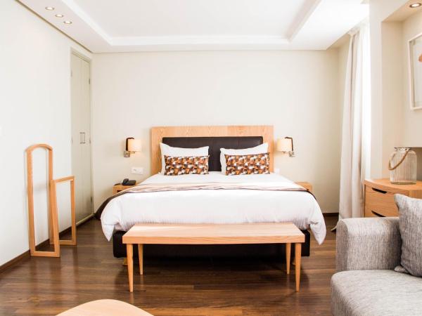 Le Pietri Urban Hotel : photo 9 de la chambre suite lit king-size avec balcon
