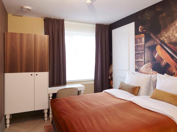 The Muse Amsterdam - Boutique Hotel : photo 1 de la chambre petite chambre lits jumeaux