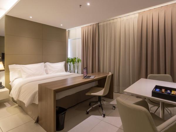 Hilton Garden Inn Belo Horizonte Lourdes : photo 6 de la chambre business class com cama king-size